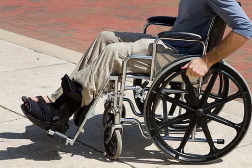 injured man in a wheelchair after an accident