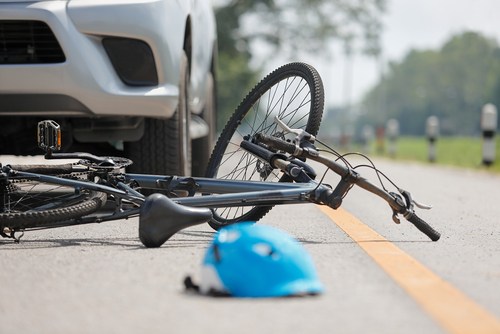 What happens if a bike hits a car door?