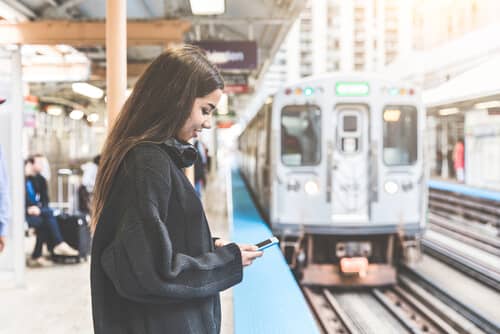 woman waiting to ride a public transportation