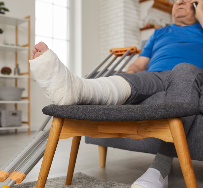 injured person with leg in cast