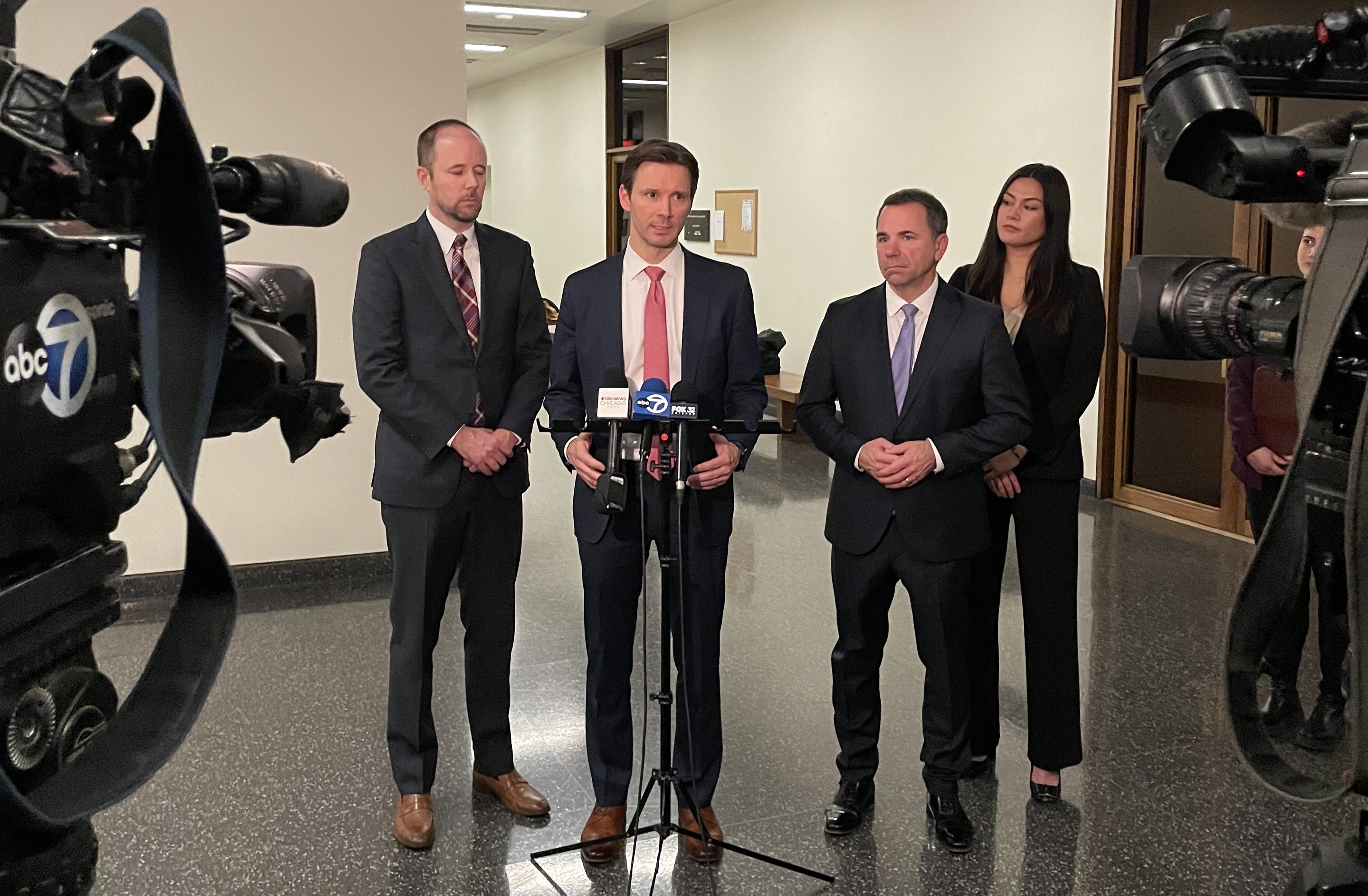 Attorneys Patrick A. Salvi II, Lance D. Northcutt, Aaron D. Boeder and Eirene N. Salvi of Salvi, Schostok & Pritchard at Spicer Press Conference.